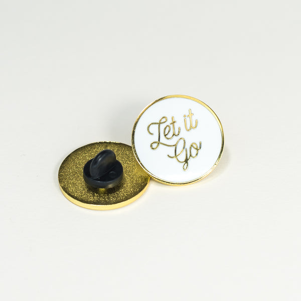 let it go gold and white enamel pin front and back