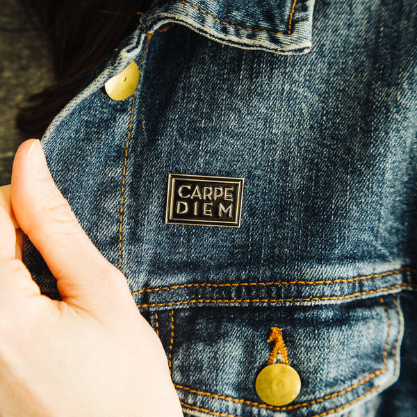 Carpe Diem Seize the Day enamel lapel hat pin on women's jean jacket