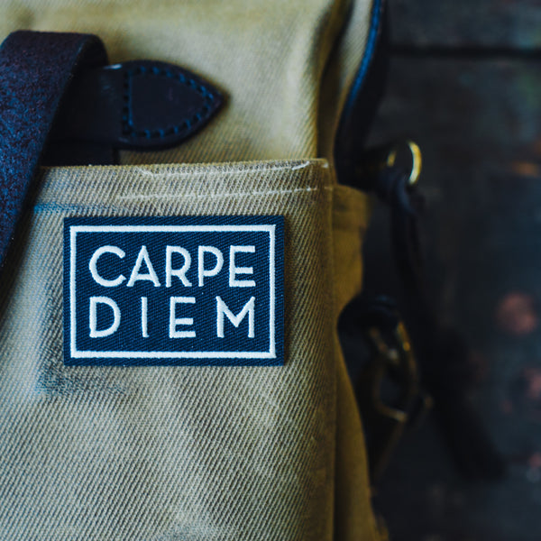 carpe diem embroidered patch on filson 256 briefcase laptop bag