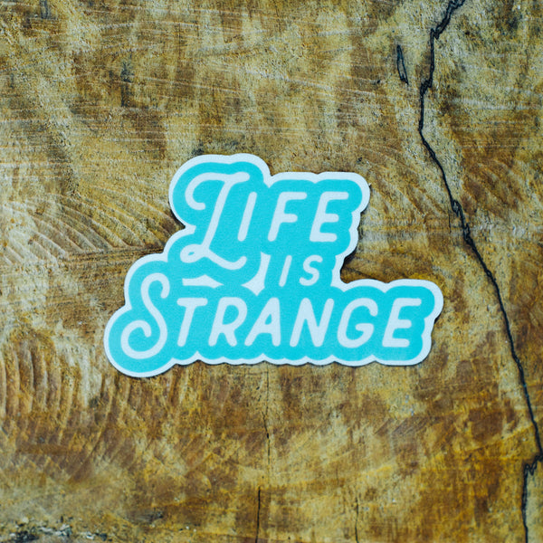 life is strange vinyl sticker on wood log background