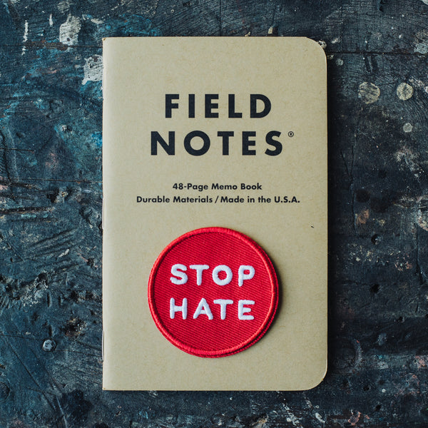 Stop hate embroidered patch on field notes book